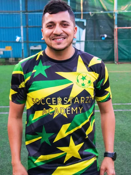 Coach Shadab, the founder, in his element on the field. His vision and passion are the driving force behind SoccerStarzz Academy.