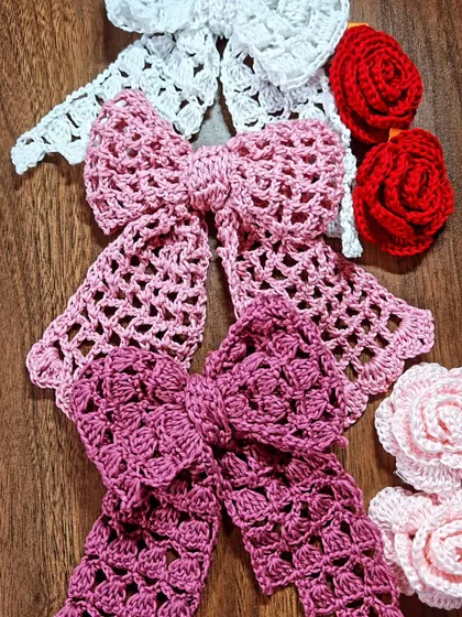 A beautiful collection of my lacy hair bows and signature rose clips, ready to find new homes. I use pure cotton yarn, so they are soft, washable, and elegant. These are perfect for gifting or just treating yourself.