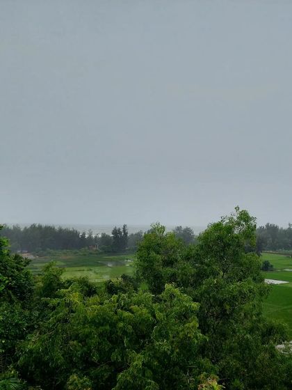 A view of the lush green landscape and paddy fields from a viewpoint on one of our monsoon trips.