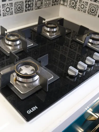 A close-up of the Glen hob, seamlessly integrated into the countertop. The choice of appliances is a key part of my end-to-end design process.