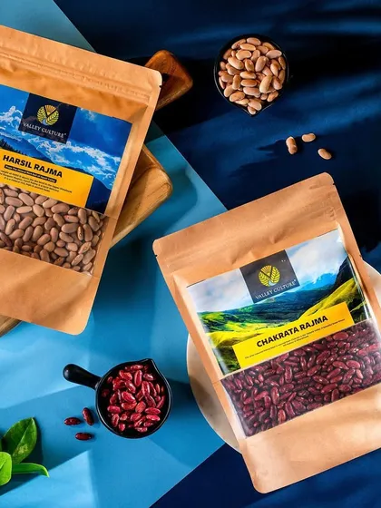 A colorful and graphic shot of Valley Culture's Rajma packaging. The bold blue background and contrasting yellow flower create a modern and eye-catching image for their traditional products.