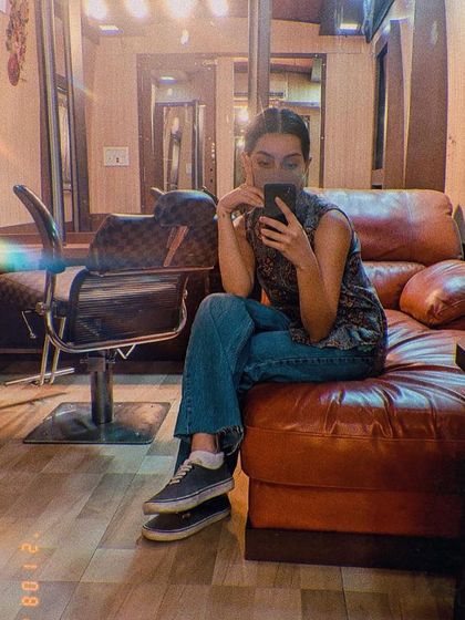 A casual moment in the vanity van during the 'Ponniyin Selvan 2' shoot. It's a contrast to the epic scale of the film, but these quiet moments are part of the journey too.