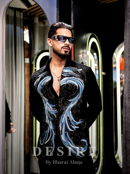 Dripping in drama, dipped in desire. This is the kind of outfit that ensures all eyes are on you, for all the right reasons.