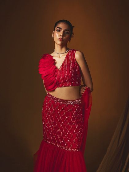 A powerful shot of the red ruffled lehenga from Label Japji Arora's "Parisa" collection.