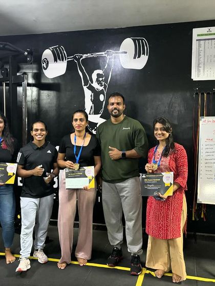 Some of our female competitors proudly showing their medals and certificates.