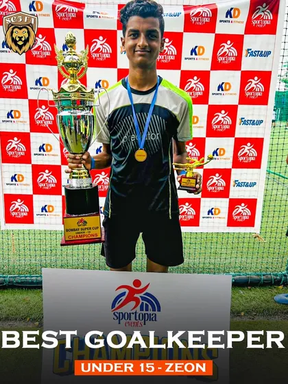Safe hands. Zeon proudly displays his trophy for Best Goalkeeper in the Under 15 category, a testament to his skill and bravery.