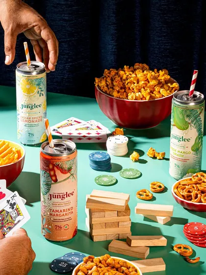 We create entire worlds around a product. This lifestyle shoot for Junglee's canned cocktails was designed to feel like a real game night with friends, showing the drinks as a natural part of a fun, social experience.