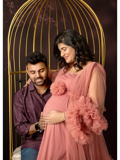 A gentle touch and a loving gaze. Capturing the interaction between partners is just as important as the solo portraits. This is their story together.