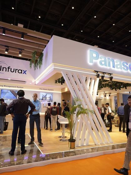The impressive and modern booth of Panasonic, showcasing their building management and fire alarm systems, a key part of the smart building solutions category.