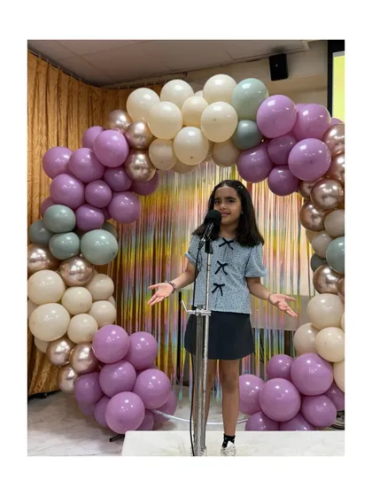 Another one of our budding comedians, learning how to structure a joke, time a punchline, and connect with an audience through humor.