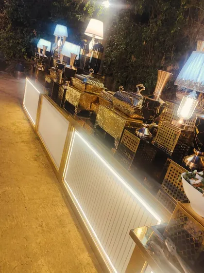 The warm glow of our LED counters and table lamps creates an inviting ambiance for this evening buffet.