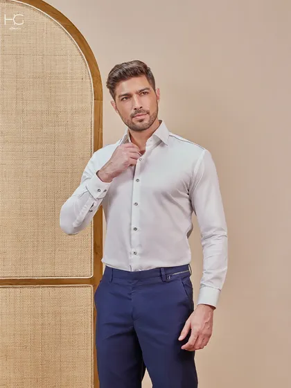 Another look at the classic office wear combination. The subtle detailing on the white shirt collar and the side-adjusters on the trousers showcase my focus on fit and finish.