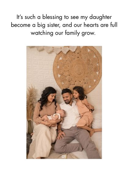 A loving family portrait capturing the blessing of seeing a daughter become a big sister.