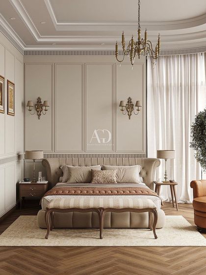 Muted classicism. This bedroom is a perfect blend of soft, muted tones and timeless class. The curved wall with large windows adds architectural interest, while the leather armchair provides a comfortable reading spot.