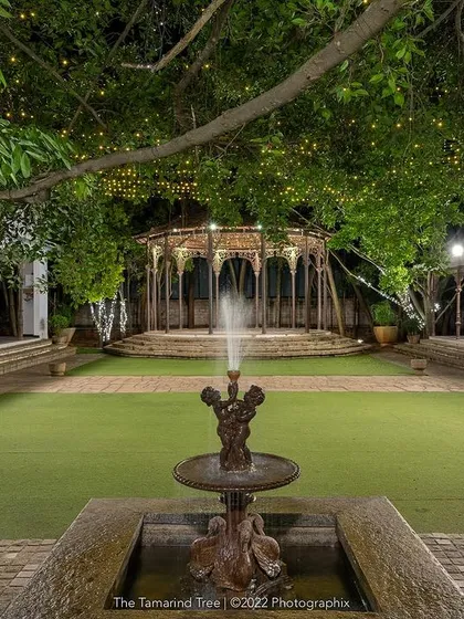 At night, the bandstand and lawn are lit by strings of fairy lights, creating a magical, starlit canopy for your celebrations.