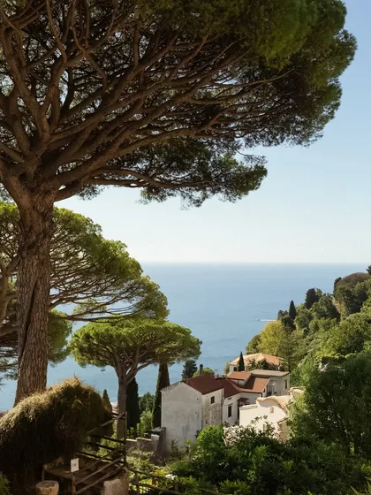 A breathtaking landscape shot of the Italian coast. This image establishes the stunning location of the pre-wedding shoot, showcasing the beauty of a destination like the Amalfi Coast.