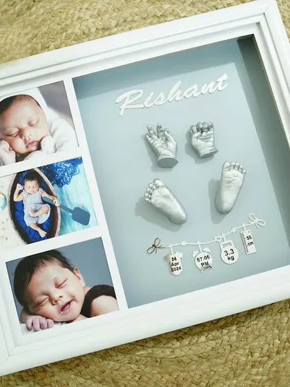 A beautiful keepsake to cherish forever. This is a standard casting frame featuring 3D casts of a baby's hands and feet, along with their first photos.