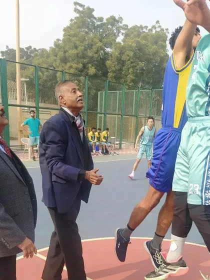 Observing a crucial moment in a match during the North Zone Inter-University Championship. As an official and a coach, I focus on the technical aspects and the spirit of the game.
