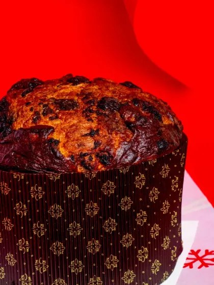 A close-up of the rich, dark crust of the Triple Chocolate Panettone.
