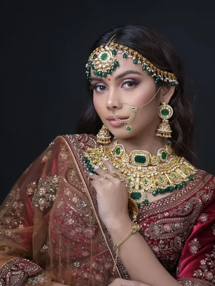 A three-quarter profile shot, highlighting the contour and nose ring.