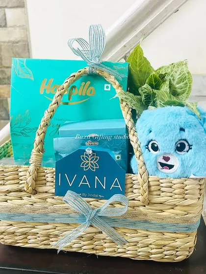 I was thrilled to collaborate with the luxury jewelry house Ivana by Jindals to create hampers that reflected their brand. I used their signature turquoise color palette and filled these elegant grass baskets with premium treats and a planter to create a sophisticated corporate gift.