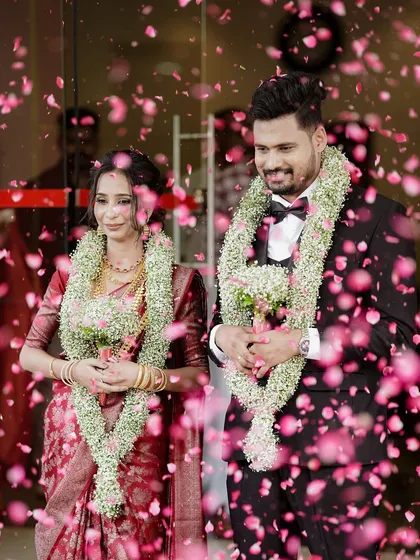 A shower of blessings and petals! This is one of my favorite moments from a Christian wedding ceremony, capturing the pure, explosive joy of the couple as they are celebrated by their loved ones.