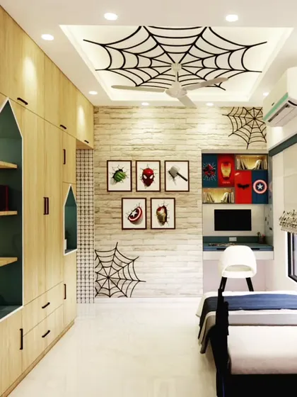 A room where a child's imagination can run wild. This Spiderman-themed bedroom features custom ceiling work, themed wall art, and plenty of storage, making it both fun and practical.