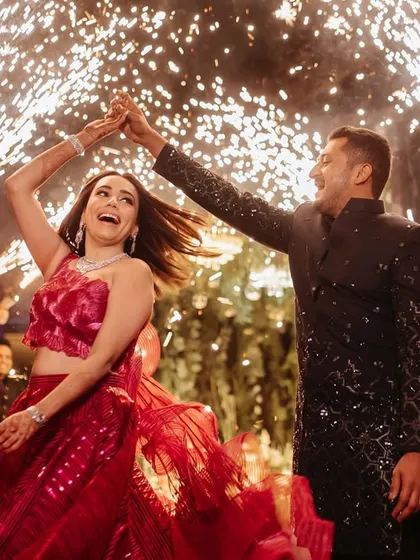 A picture-perfect entry that feels straight out of a movie. I choreograph these moments, complete with sparklers and perfect timing, to give you an entrance that is as grand as your love story.