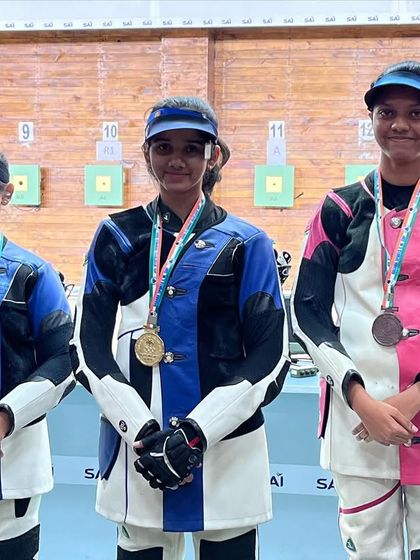 Our talented young women's air rifle team on the podium at the Dasara CM Cup, a testament to their teamwork and individual skill.