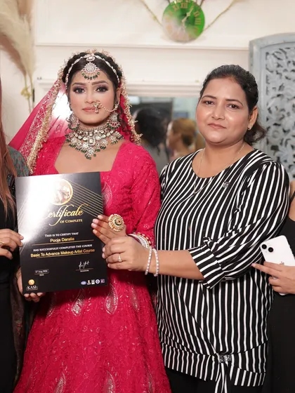 Pooja, another one of our graduates, looking proud with her certificate and her amazing makeup work.