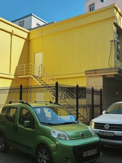 Finding interesting color combinations on the streets of Baku. This vibrant contrast of yellow and green caught my eye.