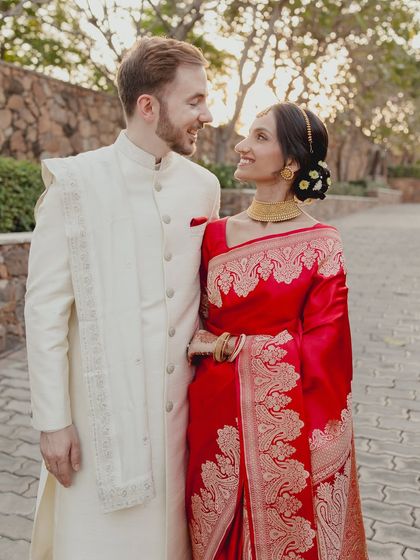 Love and laughter. This candid shot shows how her makeup stays flawless, allowing her to enjoy every moment with her partner.