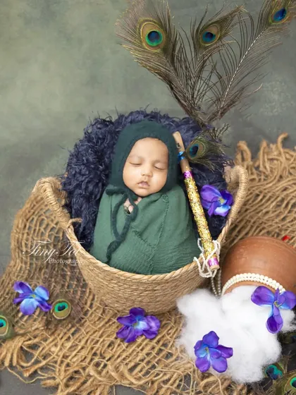 To honor your cultural traditions, I offer setups like this Little Krishna theme. This portrait features a sleeping baby with a peacock feather (mor pankh), flute (bansuri), and a pot of butter (makhan).