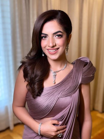 A happy, smiling portrait of Noor. The makeup enhances her natural beauty and her joyful expression.