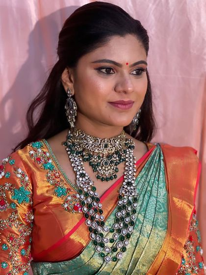 Swathi's complete reception look is a perfect example of how to style heavy, traditional jewellery with modern makeup for a balanced and beautiful result.