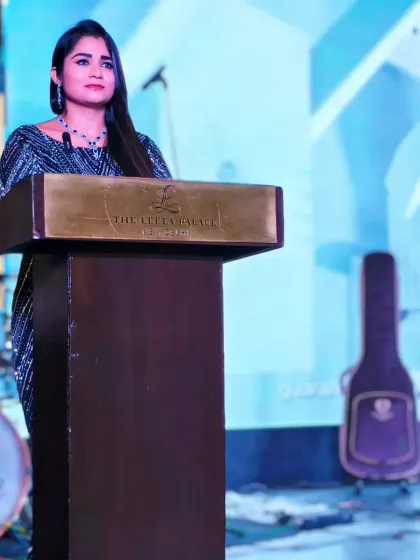 Another shot from the podium, ready to guide the audience through an evening of tech insights and networking.