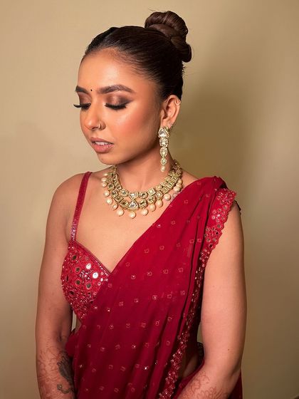 A close-up of the bold smokey eye, which is the centerpiece of this glamorous look, paired with a neutral lip to maintain balance.