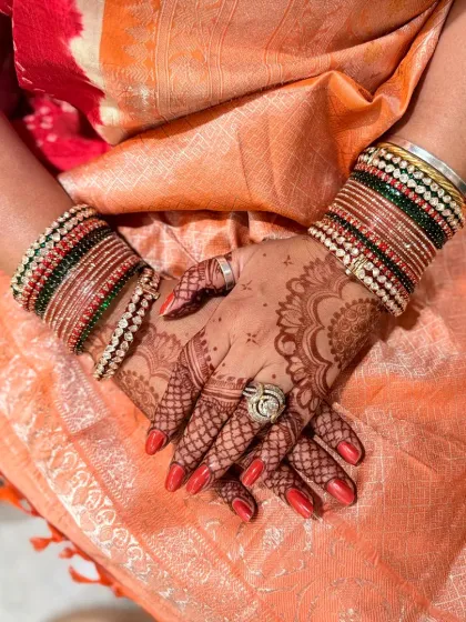 The amazing stain result of a Karwachauth mehndi, seen here with traditional bangles.