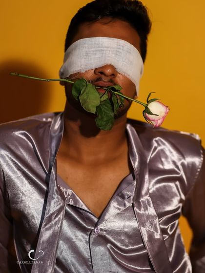 A wider shot that shows more of the satin robe, adding a layer of vulnerability and intimacy to the conceptual portrait.