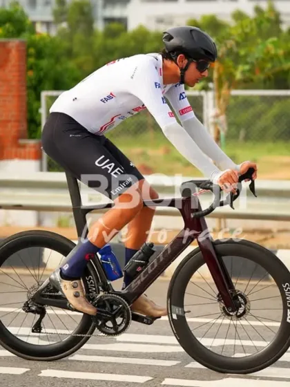 A professional cyclist from the UAE Team, a testament to the high caliber of competition my races attract from across the globe.