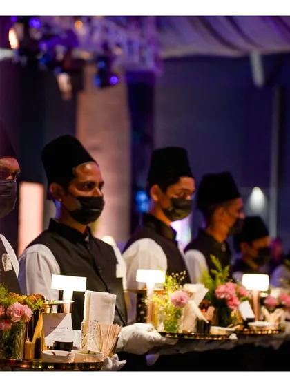 Professionalism and preparedness are the cornerstones of our service. Our uniformed staff, ready with elegantly arranged appetizer trays, stand as a testament to the seamless and organized hospitality we provide for events of any scale.