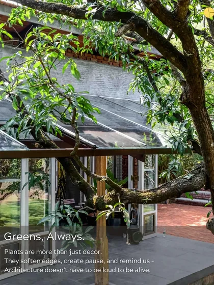 Greens are always more than just decor. They soften the hard edges of architecture, create moments of pause, and remind us that a building doesn't have to be loud to be alive.