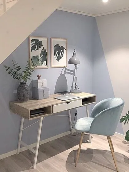 Even small corners can have a big impact. Here, we used a two-tone colour separation technique to define a stylish and functional home office space under a staircase.