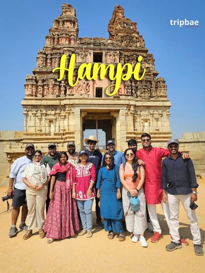 A beautiful group shot in front of the iconic Virupaksha Temple, the main center of pilgrimage in Hampi.