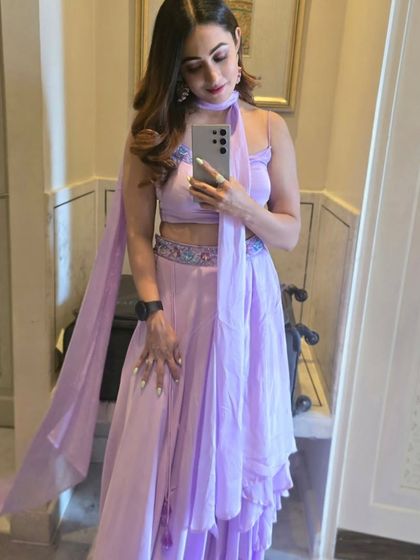 A mirror selfie in a lovely lavender outfit. I enjoy sharing my different looks with my audience, showing the versatility in my event wardrobe.