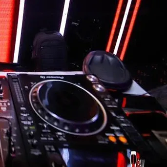 My headphones resting on the decks, waiting for the next track. A classic DJ shot.