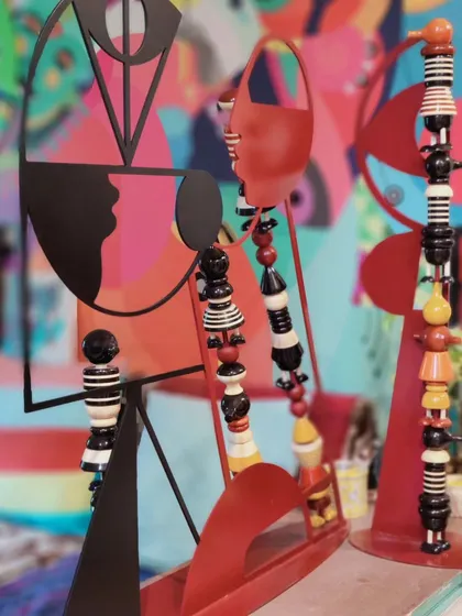 A glimpse of our 'brick and mortar magic shop'. These small sculptures, made from wood and metal, are part of our explorations in form and color that often inform our larger projects.
