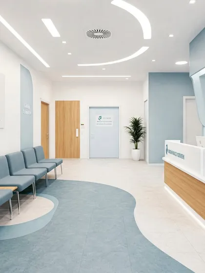 This clinic waiting area uses flowing, curved lines on the floor and ceiling to guide visitors. The design combines light wood tones with a calming blue accent wall for a modern and patient-friendly environment.