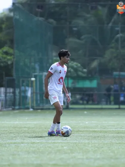 A player stands ready, calm and composed, embodying the heart and chemistry of our squad.