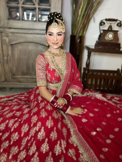 An extensive series of our classic red bridal lehenga. These images capture every detail, from the embroidery to the full bridal styling, providing a complete reference.